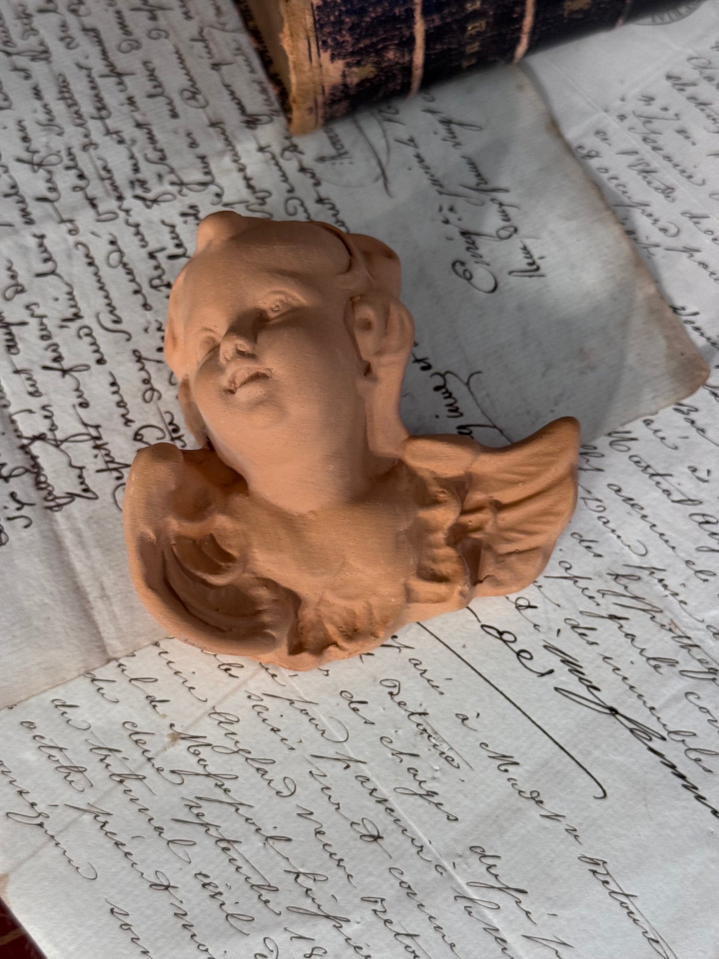 Handcrafted Florentine Terracotta Cherub with Raised Wings