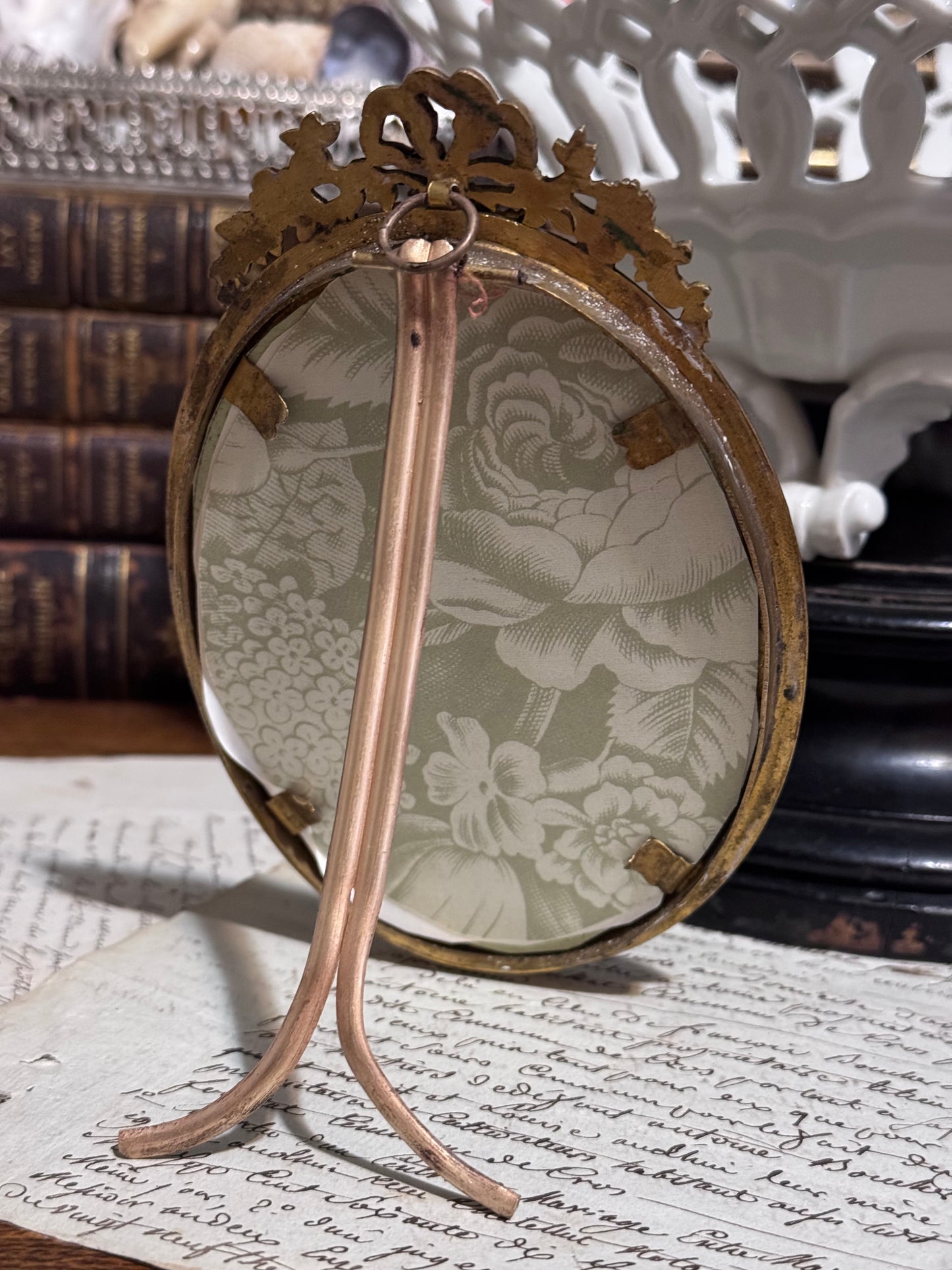 Antique French Bronze Oval Frame with Ribbon Crest