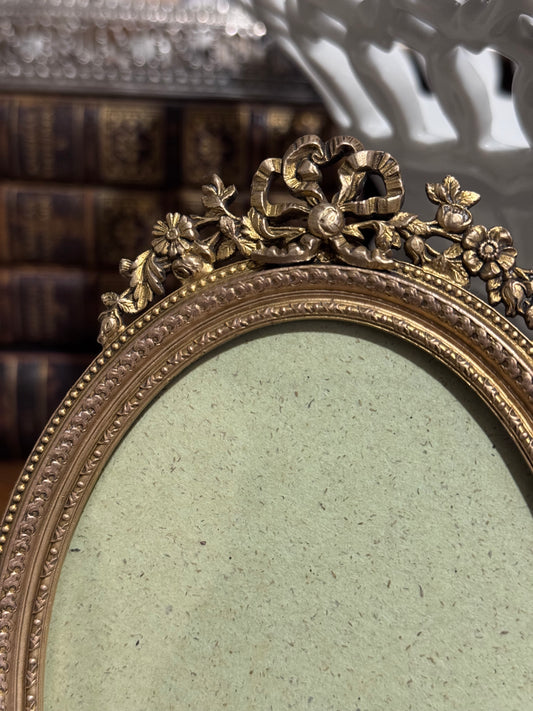 Antique French Bronze Oval Frame with Ribbon Crest